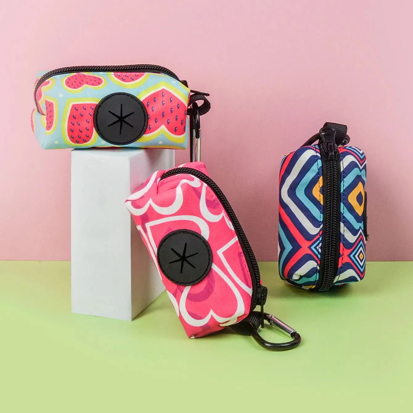 cute dog poop bag holder dispenser with colorful patterns, zipper closure, and leash clip for stylish dog walks