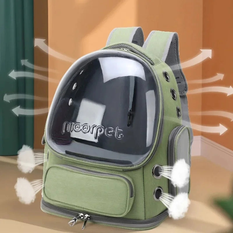 Green cat carrier backpack with transparent bubble window, breathable design, and zipper closure for cats and small dogs