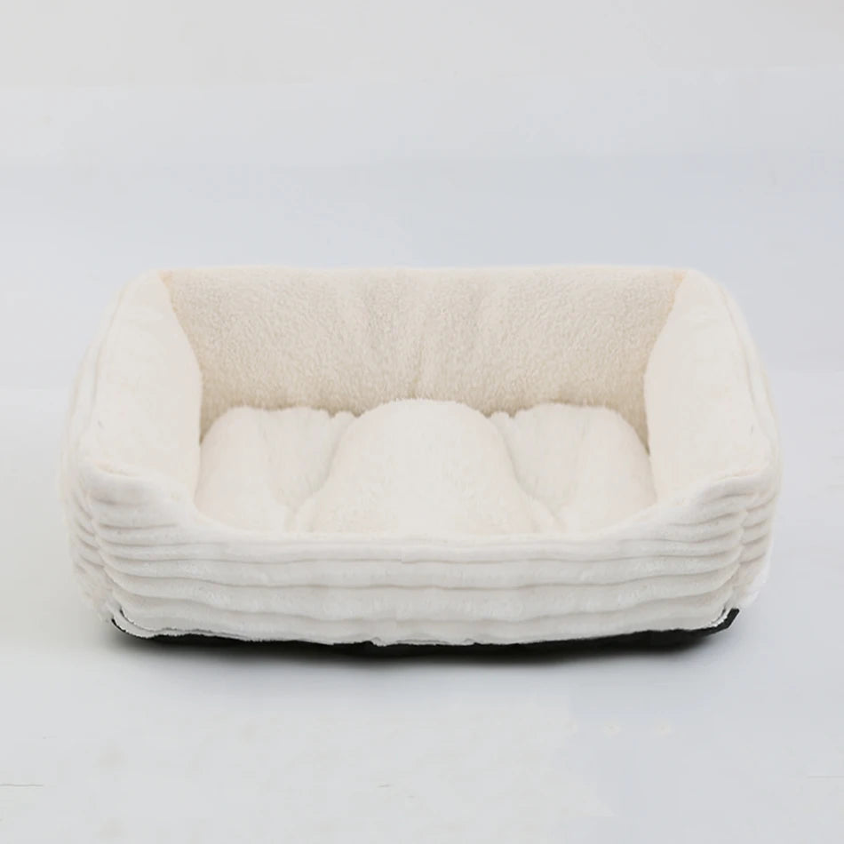 Soft white calming dog bed for small pets, plush square sofa-style kennel cushion for cozy indoor comfort