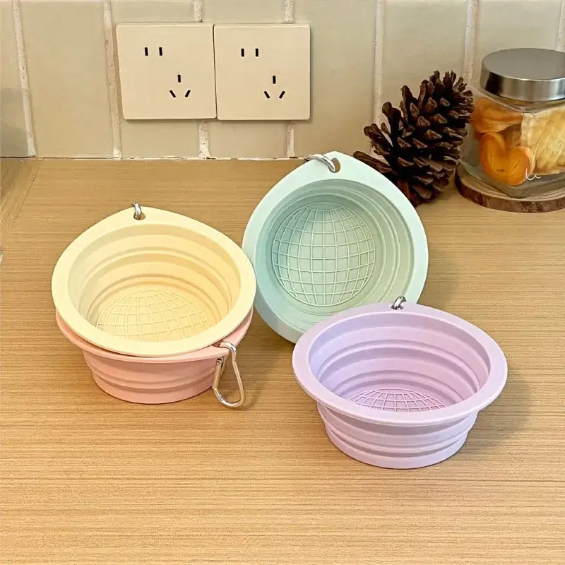 Collapsible travel dog bowl for pets, foldable silicone feeding bowl for water or food, lightweight portable design.