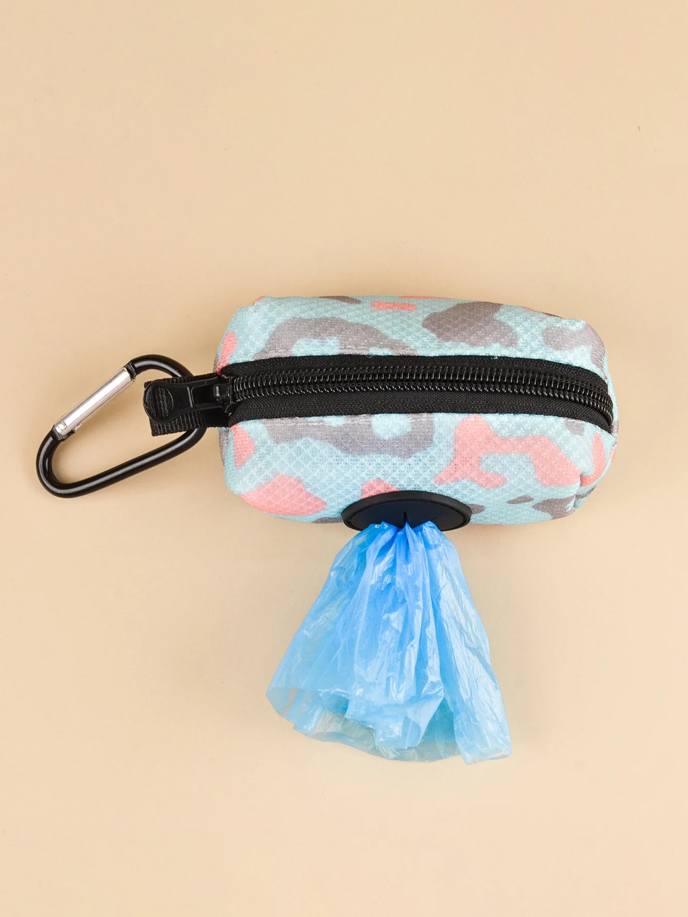 Abstract patterned dog poop bag holder dispenser with carabiner clip and bag opening for leash attachment