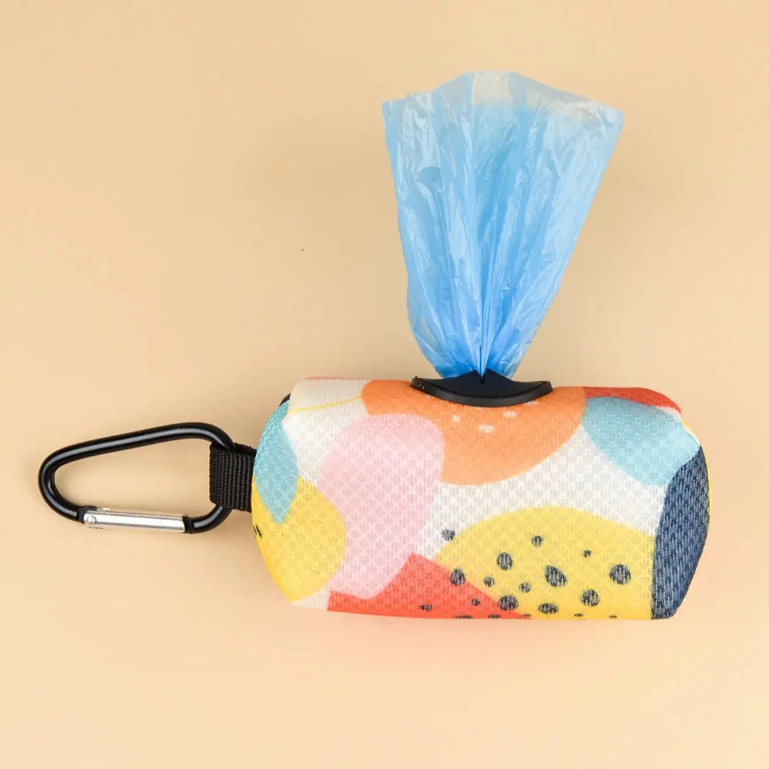 Colorful dog poop bag holder dispenser with carabiner clip and blue bag, portable patterned pet waste bag holder