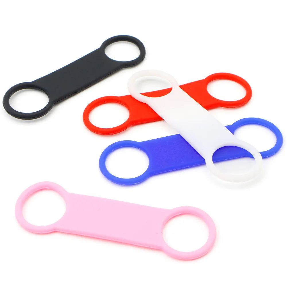 Personalized silicone dog collar accessories in assorted colors: black, white, red, blue, and pink for pets.