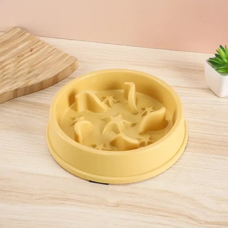 Yellow slow feeder pet bowl for small dogs and cats, anti-slip anti-tip plastic food dish to prevent choking