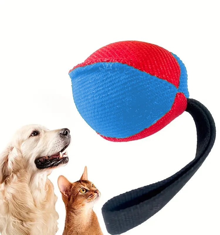 Red and blue rope ball toy with black handle, dog and cat looking at pet toy