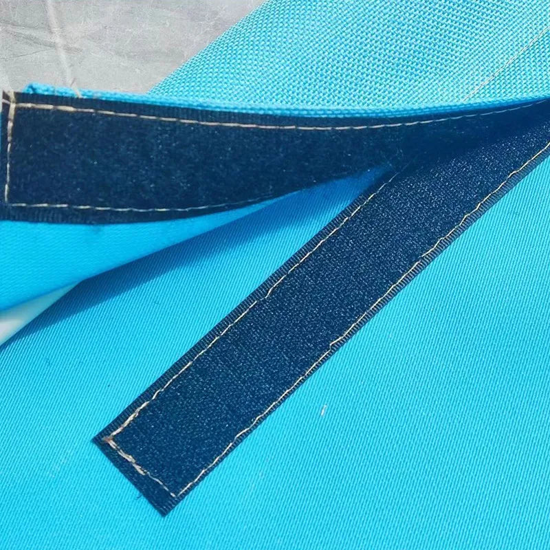 elevated dog camping bed with durable blue nylon fabric and reinforced Velcro strap for portable pet support