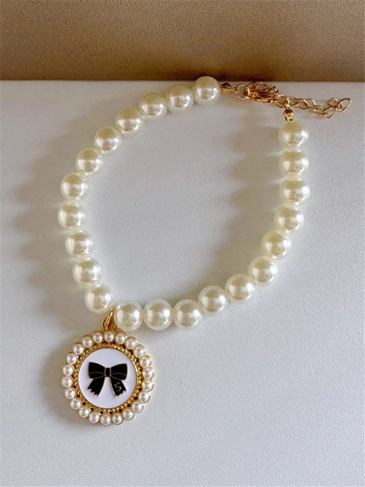 pet pearl necklace collar for dogs and cats, luxury beaded accessory with gold bow charm