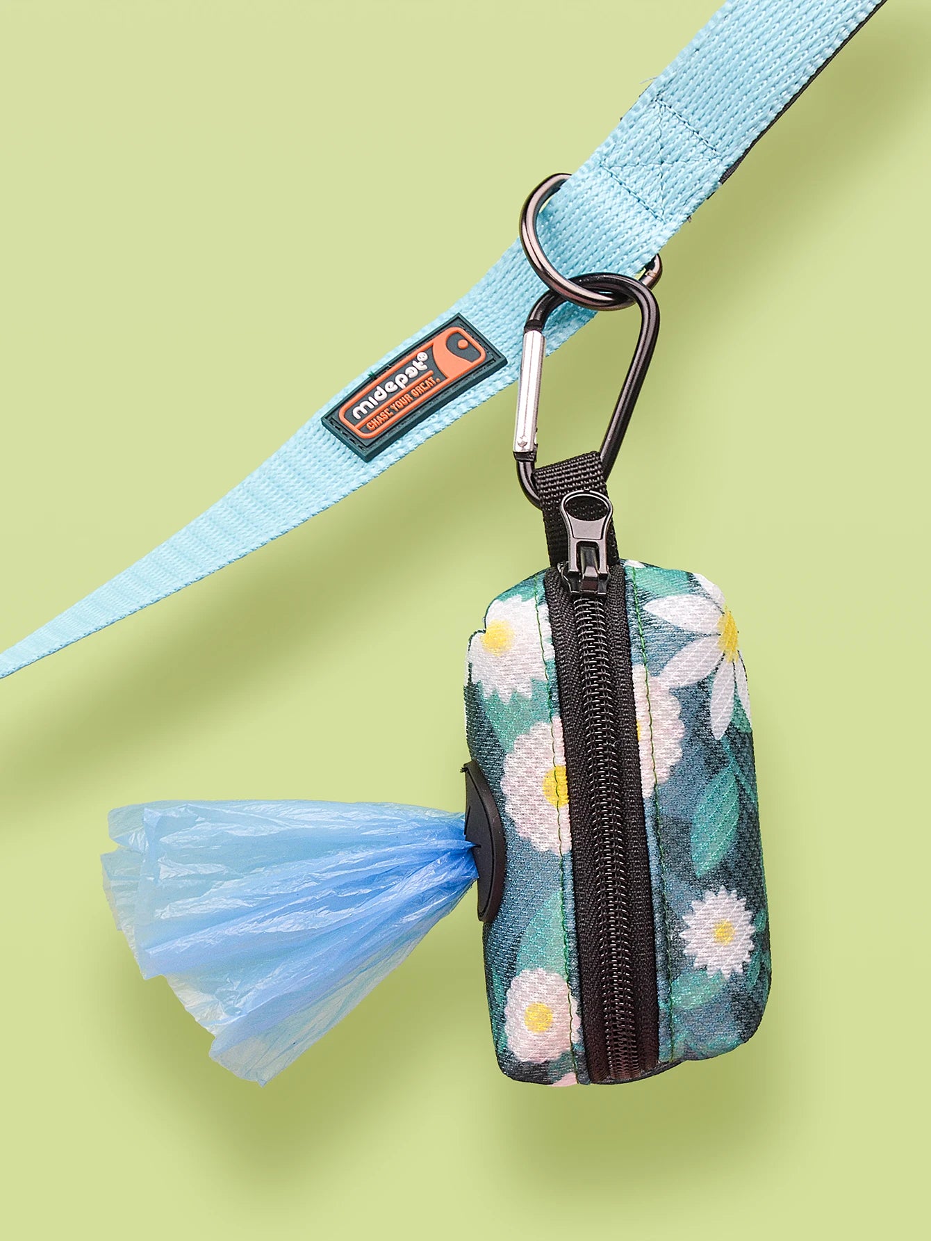 Floral dog poop bag holder dispenser with clip-on design for leashes and easy waste bag storage