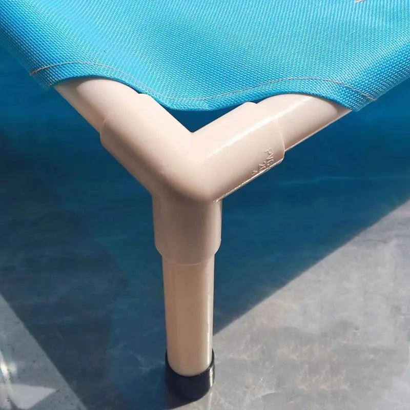 elevated dog camping bed with sturdy beige frame and blue breathable fabric for portable indoor and outdoor pet comfort