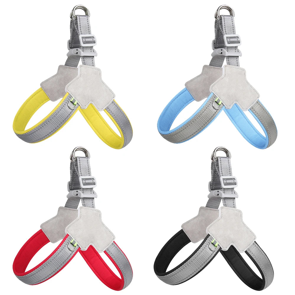 Set of four adjustable dog harnesses in yellow, blue, red, and black with gray trim.