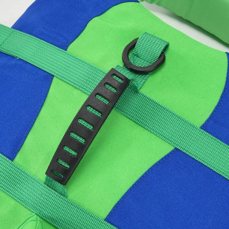 Dog life jacket with reflective straps, reinforced handle, and buoyant waterproof design for safe swimming and surfing
