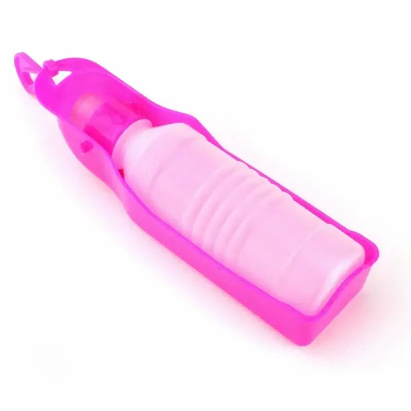 Pink portable dog water bottle for dogs and cats, leakproof plastic pet water dispenser for outdoor walking and travel