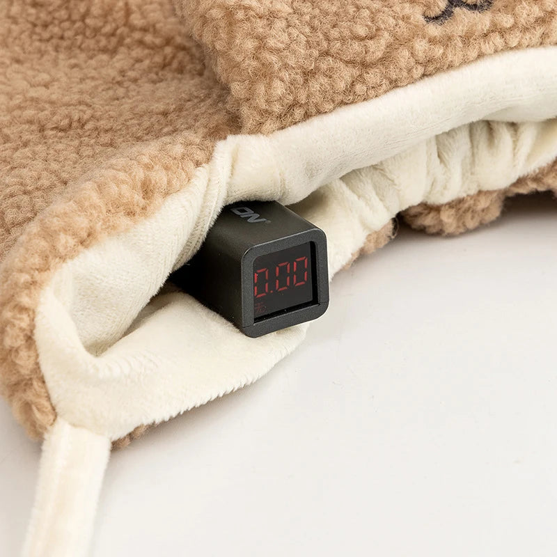 Soft fleece dog blanket with digital temperature display on a white surface