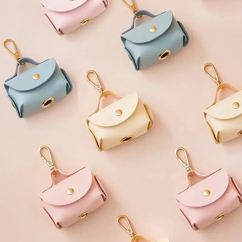 Dog Poop Garbage Bag Dispenser Portable Leather Dog Pooper Scoopers Bag Outdoor Walking Pet Supplies in various colors.