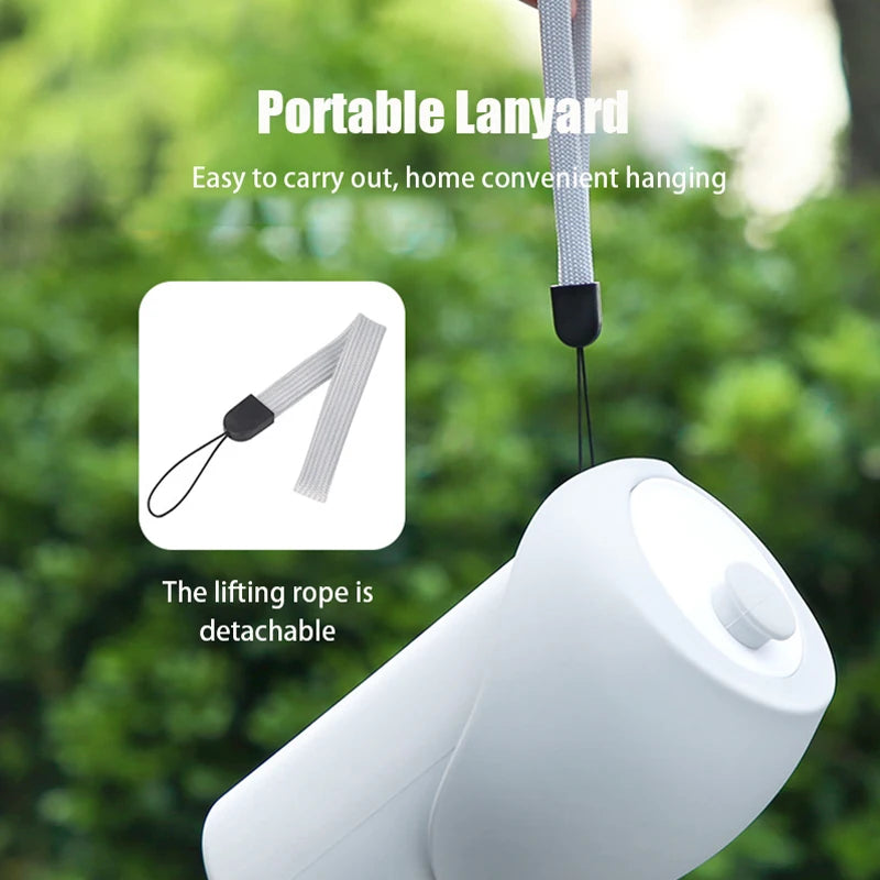 Portable dog travel water cup with detachable lanyard, hanging design, and compact pet travel bowl for outdoor walks