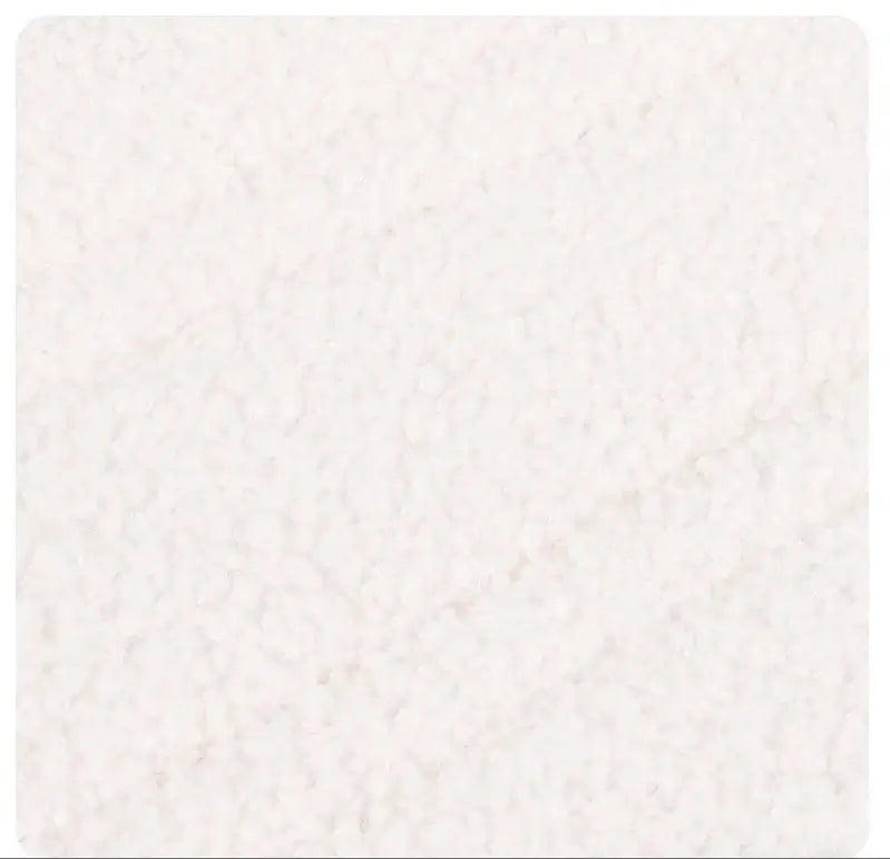 Soft and fluffy white fleece texture for dog lift harness comfort and warmth.