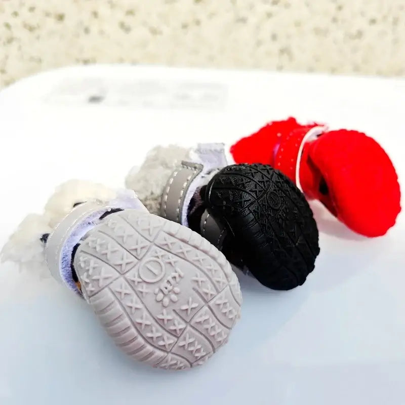 winter leopard boots for small dogs in red, black, and grey colors arranged together