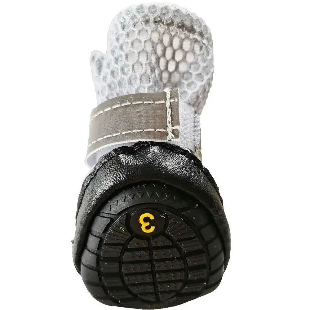 Winter dog boots for small dogs featuring antiskid sole and waterproof design for enhanced paw protection.
