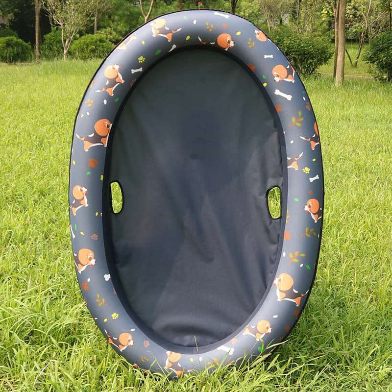 inflatable dog swimming pool float with a cute dog pattern on a grassy background