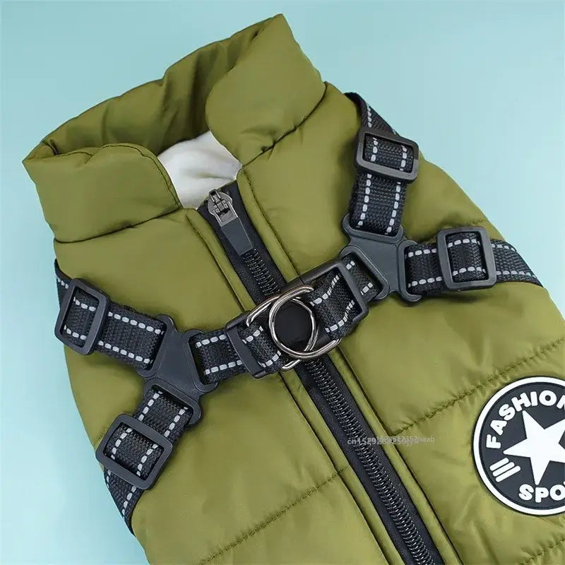 Waterproof dog jacket with harness in olive green with a stylish design for winter dog wear.
