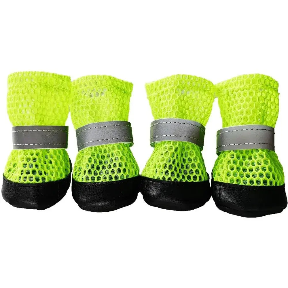 4pcs winter dog boots for small dogs in bright yellow with reflective straps and protective soles.
