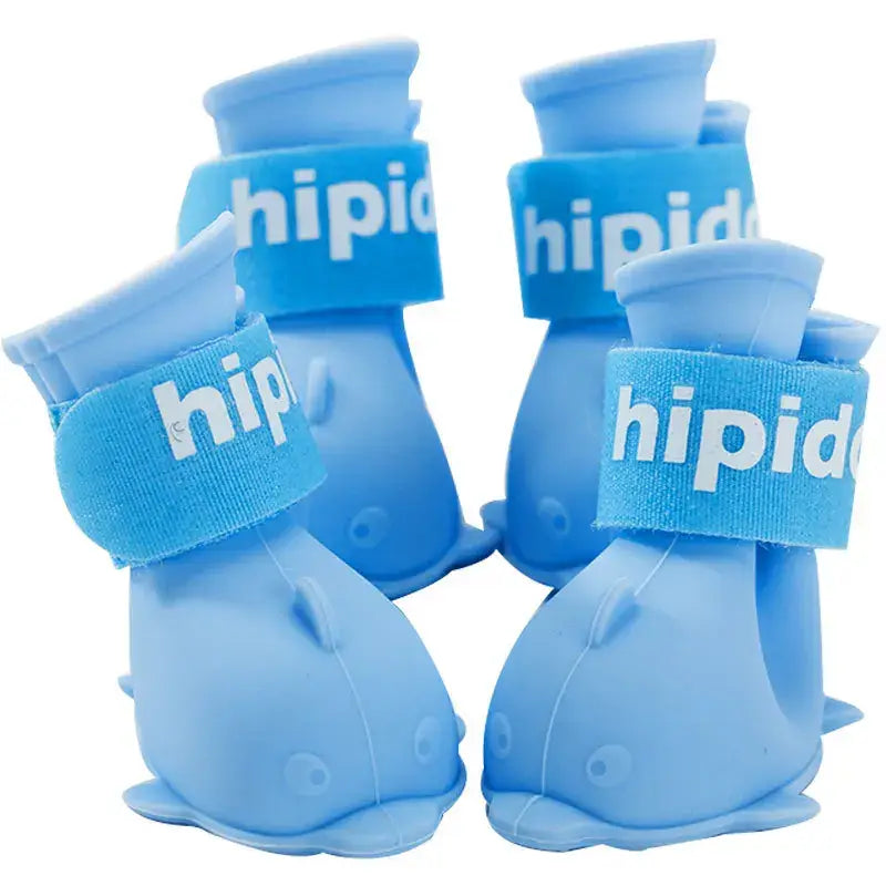 4Pcs waterproof dog boots in blue, anti-slip rubber ankle shoes for small to large dogs and cats, outdoor pet accessories.