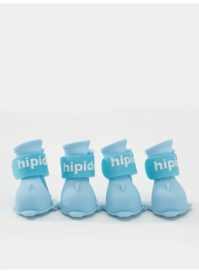 4Pcs waterproof dog boots in blue rubber material, perfect for protecting small to large dogs&