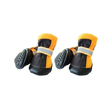 4pcs winter dog boots for small dogs in orange color, waterproof and reflective antiskid shoes for winter protection.