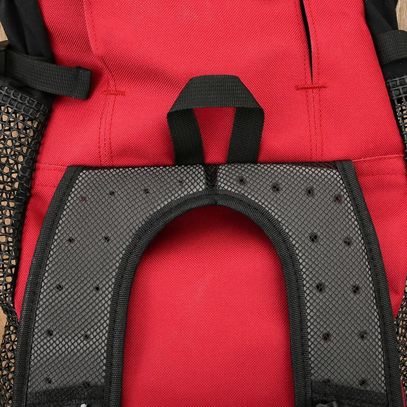 Red breathable dog backpack carrier with padded mesh support and top handle for small dog travel