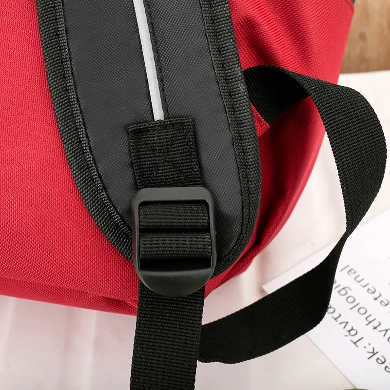 Red breathable dog backpack carrier with adjustable black straps for small dogs, ideal for outdoor travel and walking