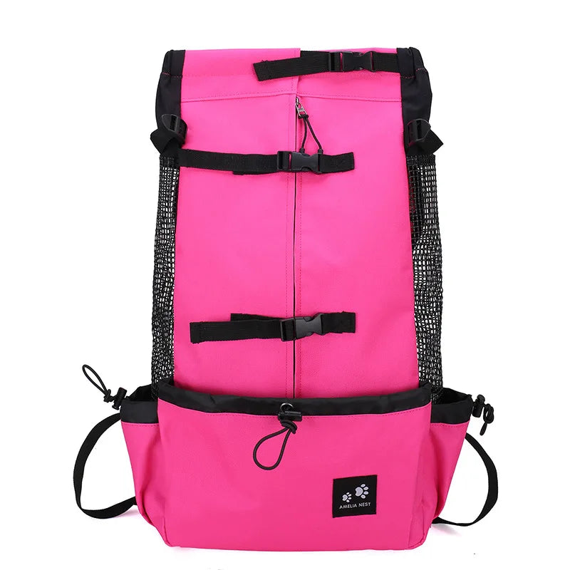 Bright pink breathable dog backpack carrier with zipper, adjustable straps, and side pockets for small dogs