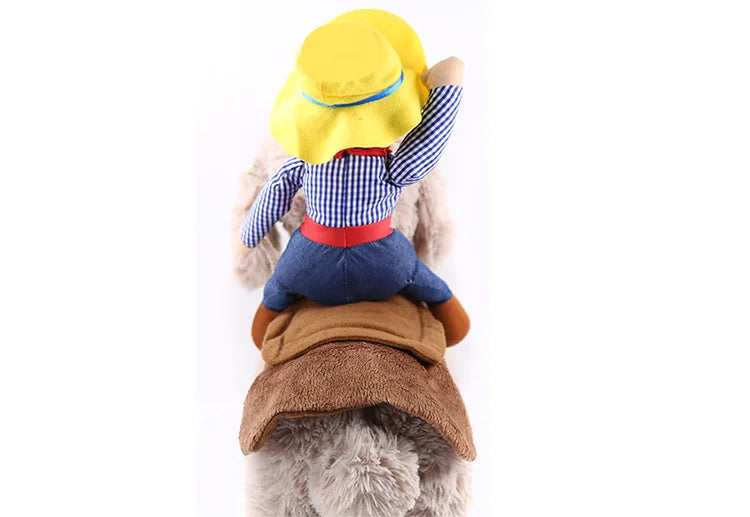 Dog wearing a funny cowboy rider costume with plush doll and brown saddle on its back