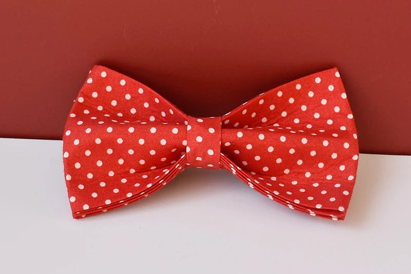 adjustable red bowtie dog collar with red polka dot bow and quick-release design for small dogs and cats