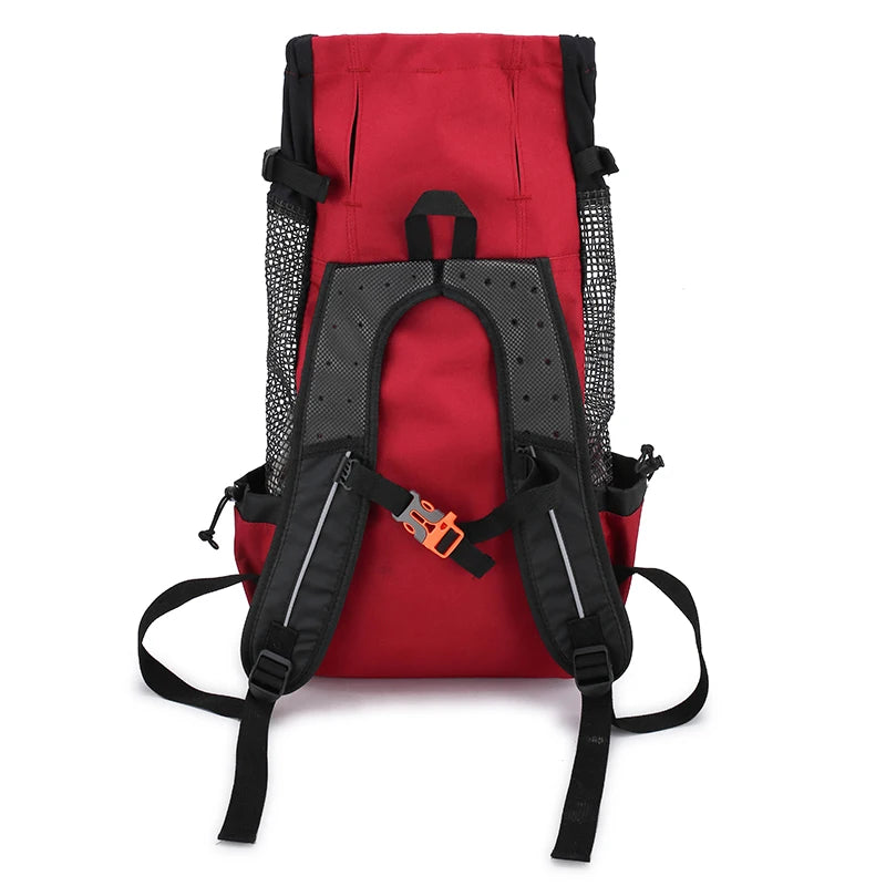 Red breathable dog backpack carrier for small dogs, adjustable pet travel backpack with secure zipper and mesh sides