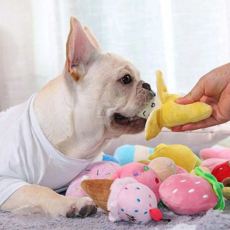 French bulldog playing with plush squeaky dog chew toy banana, soft dog squeaky toy for small and medium dogs