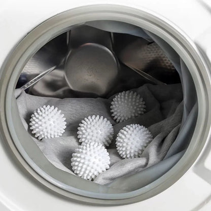 laundry anti-winding balls in washing machine with clothes, reusable anti-tangle laundry cleaning essentials