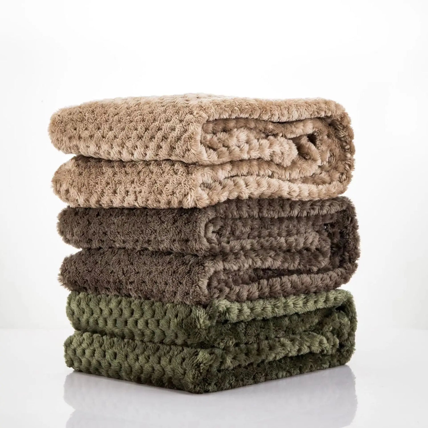 Soft pet blanket stack in beige, brown, and green for warm dog and cat beds, cozy washable pet bedding