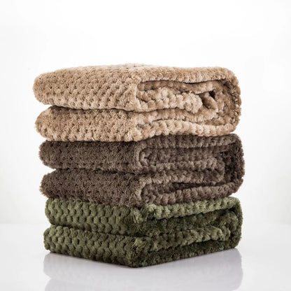Soft pet blanket stack in beige, brown, and green for warm dog and cat beds, cozy washable pet bedding