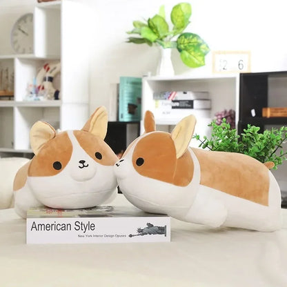 Two plush corgi dog toys on a table in a modern living room setting