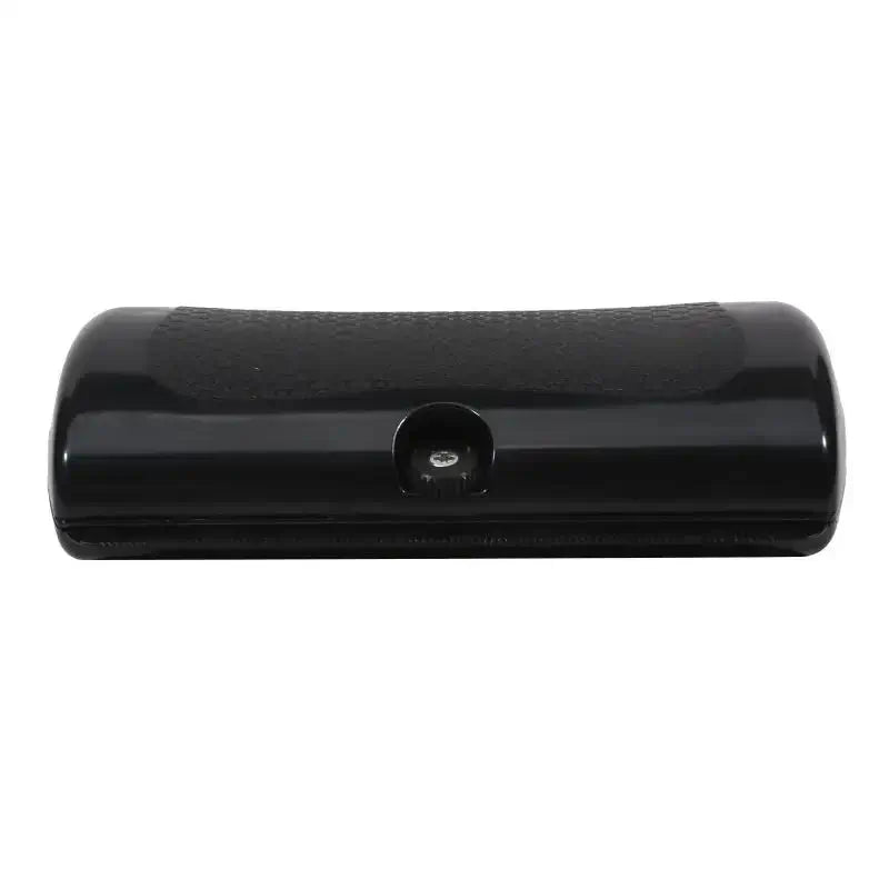 Black pet deshedding brush for dogs and cats, ergonomic grooming tool to remove loose hair and reduce shedding