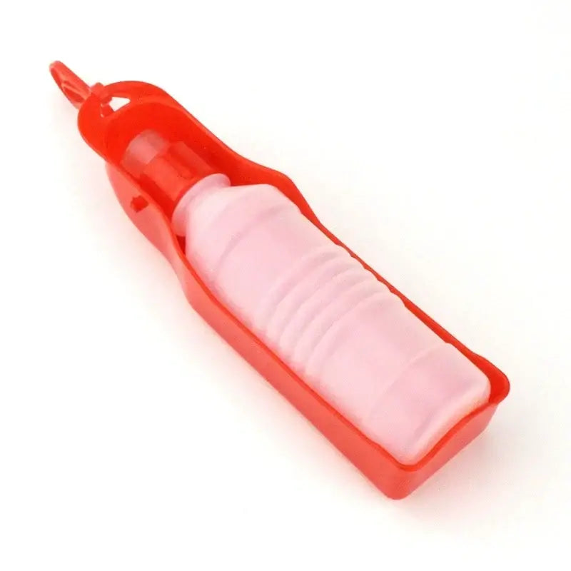 Red portable dog water bottle for outdoor walking and travel, leakproof plastic pet water dispenser for dogs and cats