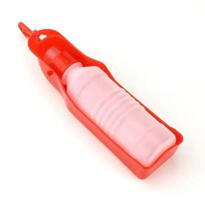 Red portable dog water bottle for outdoor walking and travel, leakproof plastic pet water dispenser for dogs and cats