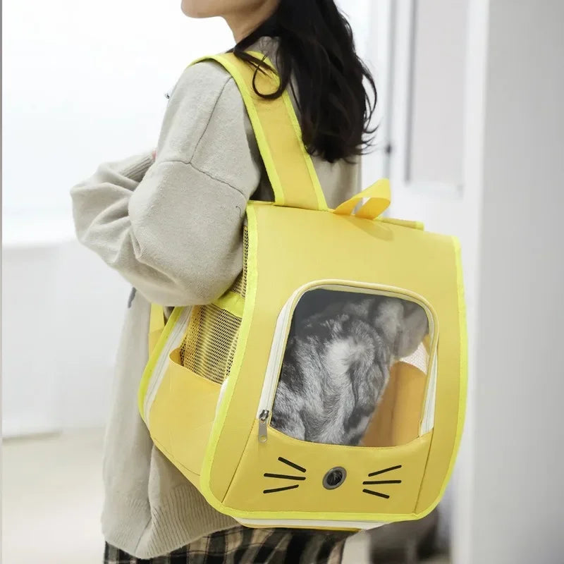 Woman wearing a yellow breathable pet carrier backpack for cats and small dogs, portable outdoor transport bag
