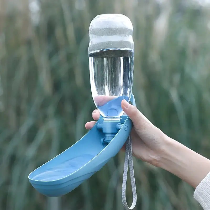 portable dog water bottle with foldable drinking bowl for small and large dogs, ideal for outdoor travel and walking