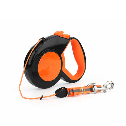 Orange reflective retractable dog leash with automatic extending traction rope, quick release handle, and durable plastic housing