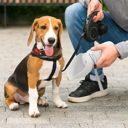 portable dog water bottle for outdoor walks, leak proof foldable silicone design with beagle and owner