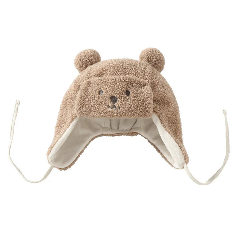 Plush brown dog winter hat with bear ears and face, fleece-lined, ear flaps, chin ties