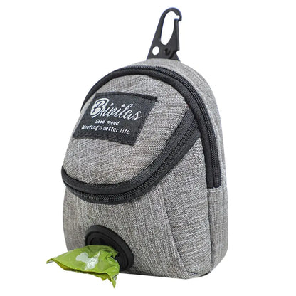 Gray dog waste bag dispenser pouch with zipper, carabiner, and green bag showing