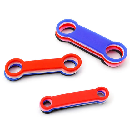Personalized silicone dog collar accessories in three vibrant colors and varying sizes.