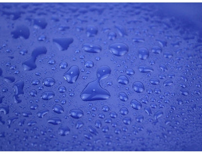 Close-up of droplets on a waterproof surface, perfect for showcasing a Large Dog Raincoat Corgi Cloak Style Puppy Waterproof Dog Clothes.